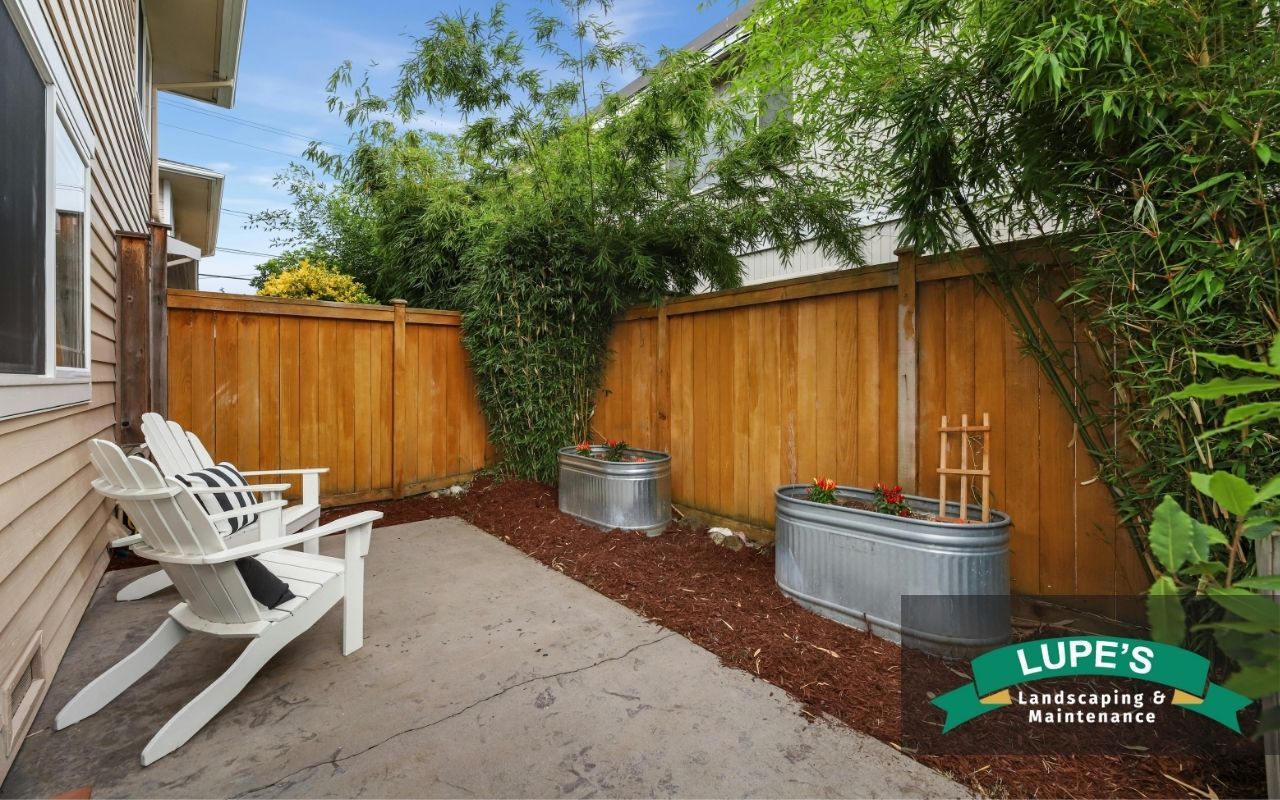 1. Backyard patio made from recycled materials and native stone