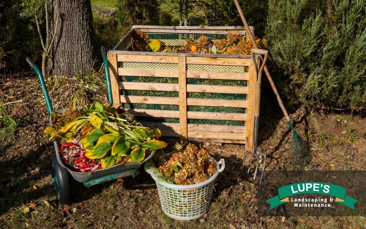 Compost bin filled with leaves and garden trimmings for fall