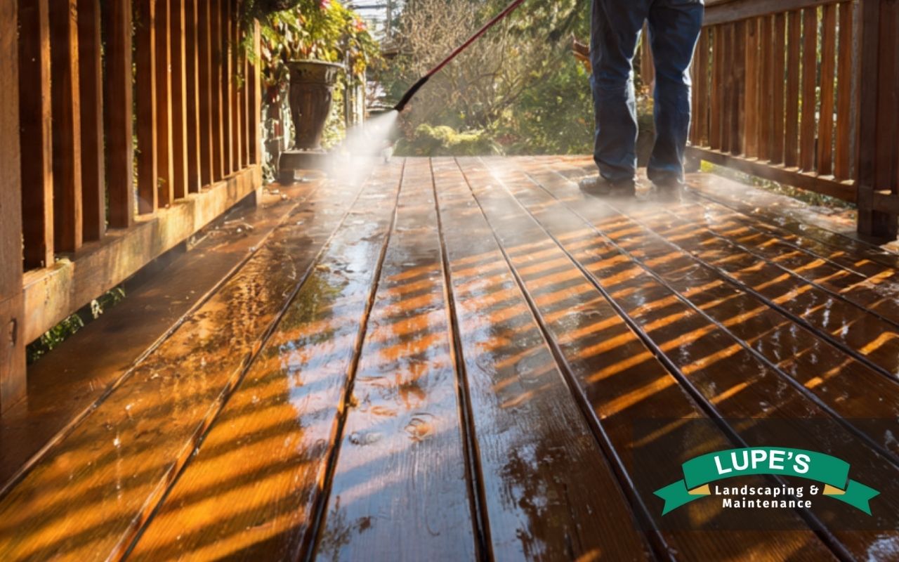 Homeowner doing winter deck cleaning for deck mold prevention in Bainbridge Island